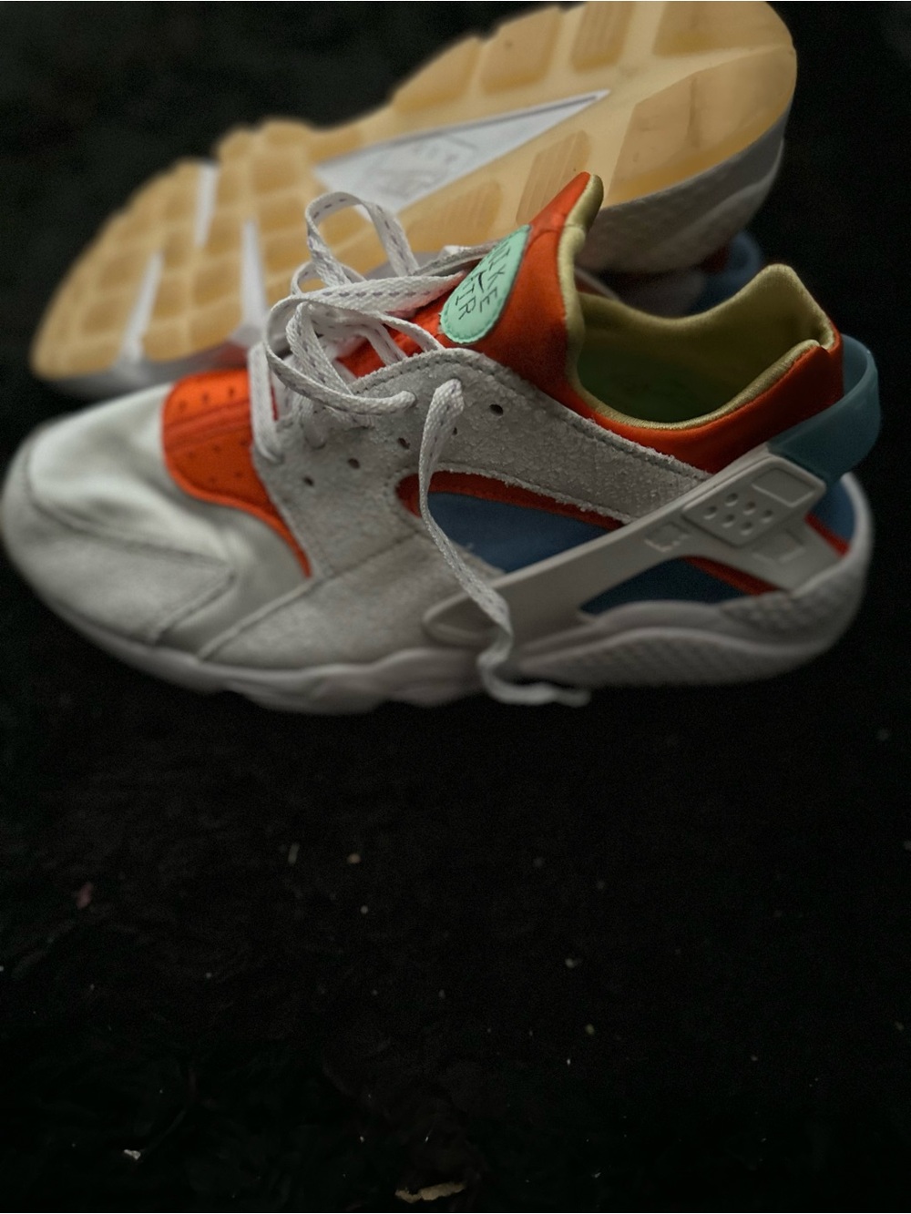 Nike White Sneakers with Orange and Blue Accents